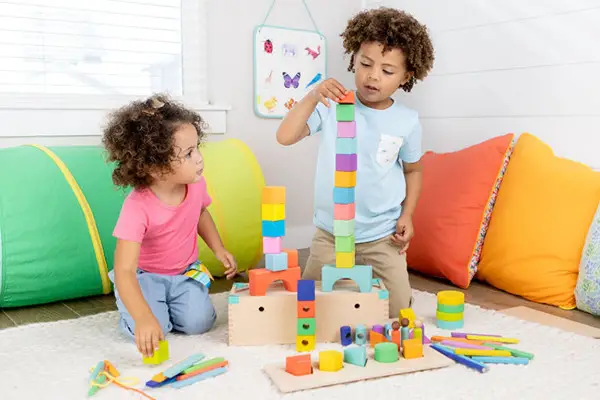 building a block tower with a toddler